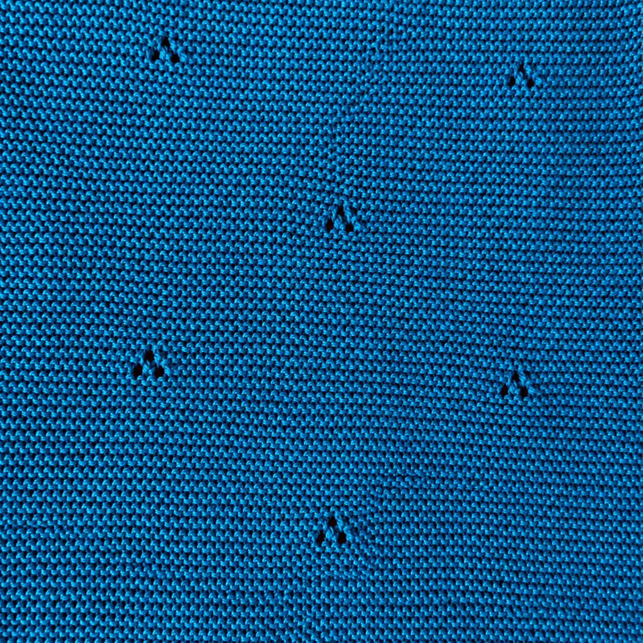 Detail van het ingebreide motief overslagshirt