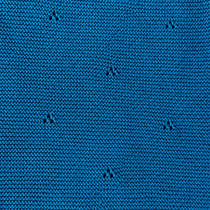 Detail van het ingebreide motief overslagshirt
