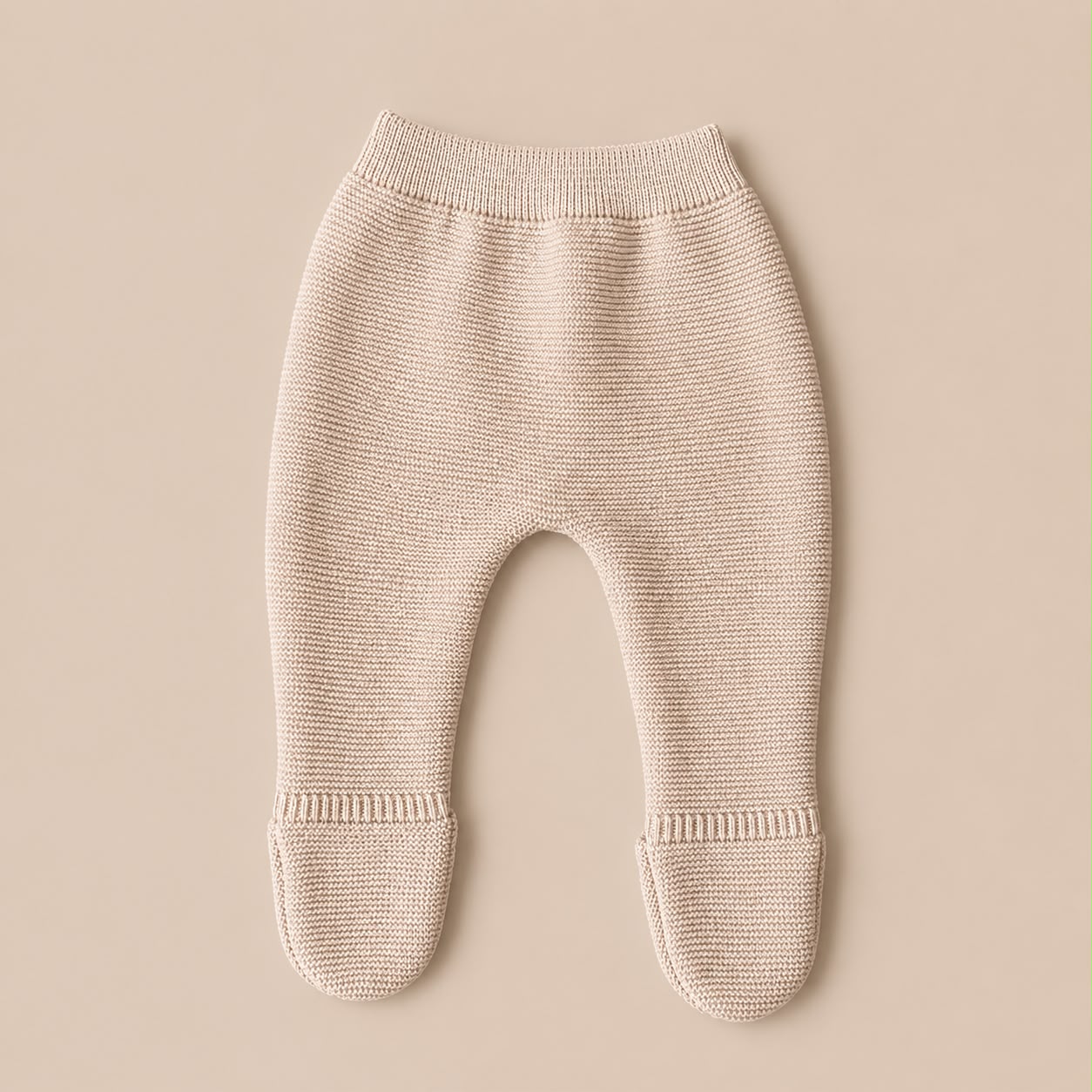 Broekje met groetjes in zandbeige maat 62/68 