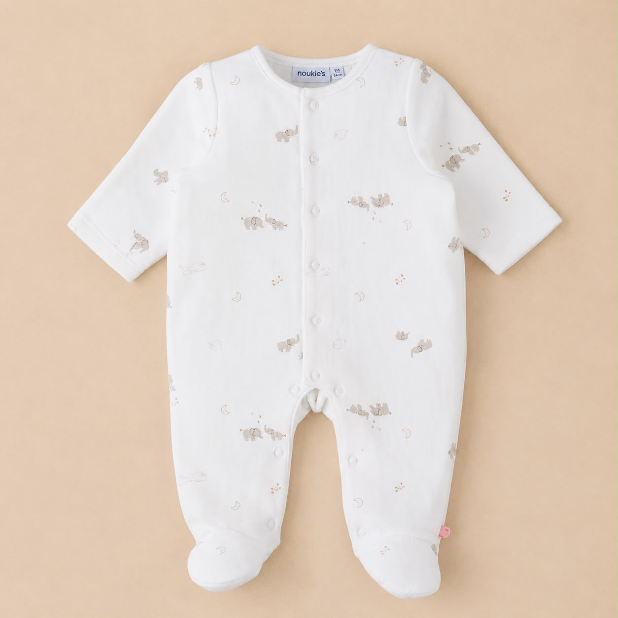 Wit zacht baby pakje met all over print van noukie's